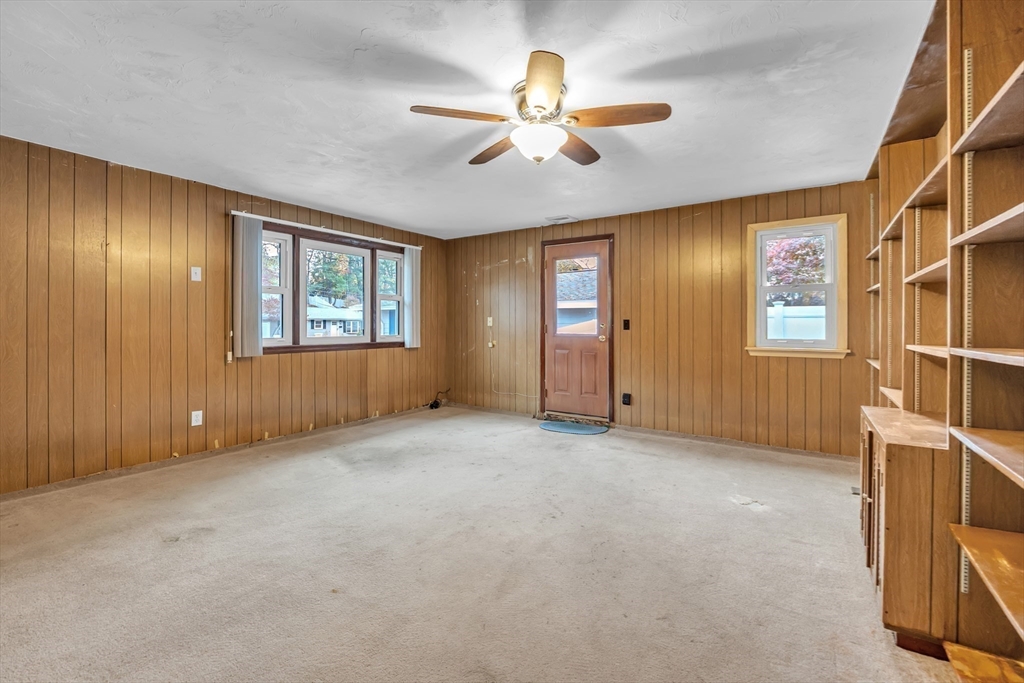 15 Fairbrook Road Framingham, MA 01701 - Photo 16 of 28 an empty room with windows and fan