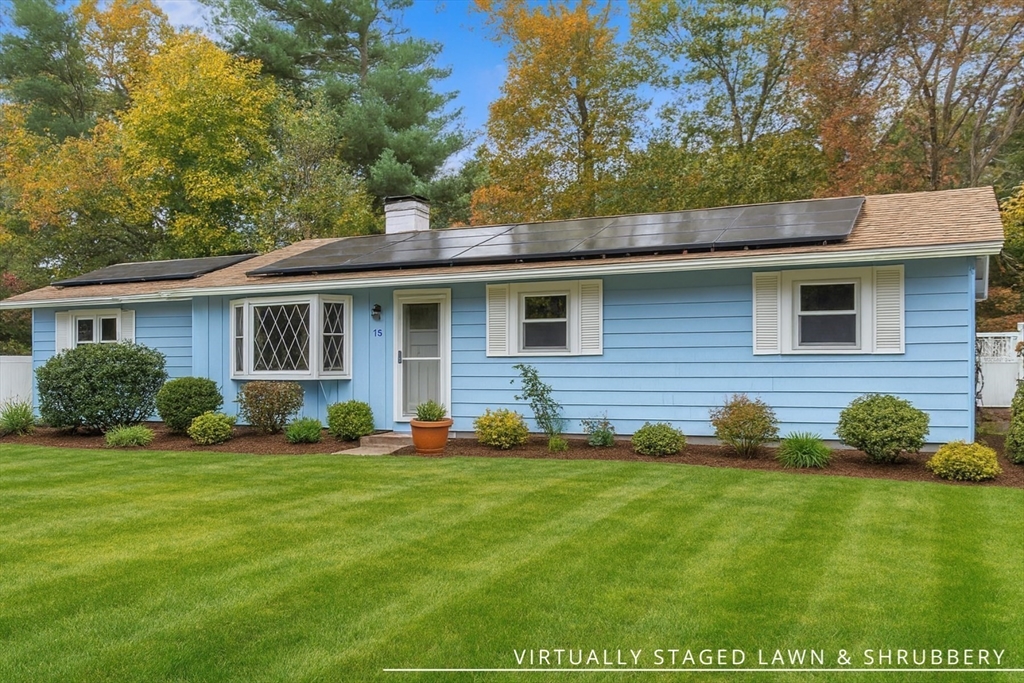 15 Fairbrook Road Framingham, MA 01701 - Photo 2 of 28 a front view of a house with a yard and trees
