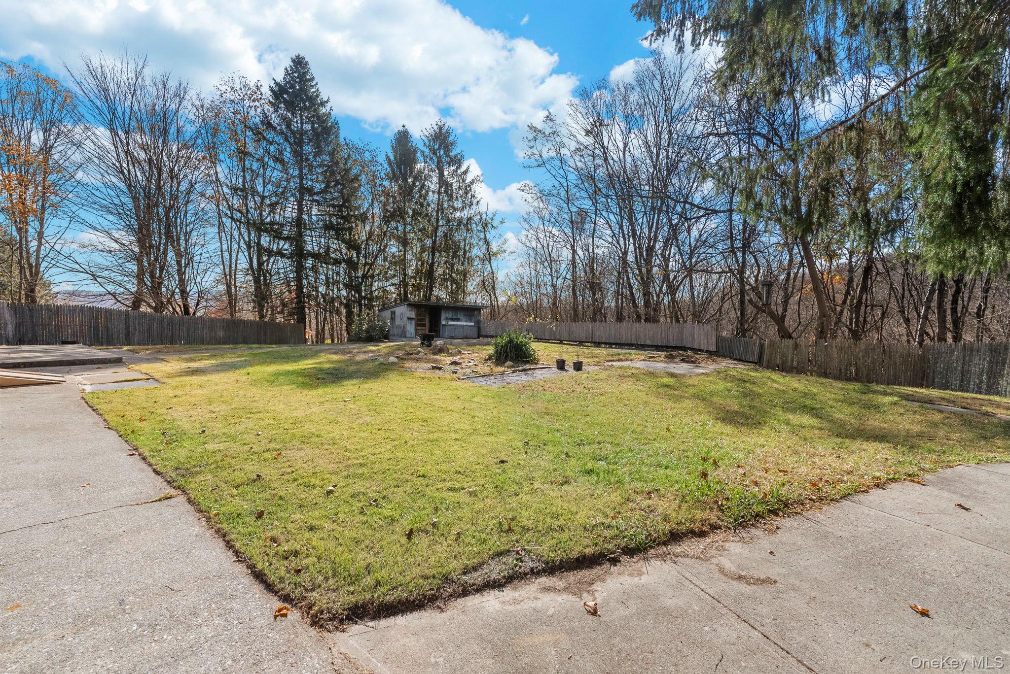 45 Baker Road Hopewell Junction, NY 12533 - Photo 40 of 41 a swimming pool with trees in the background