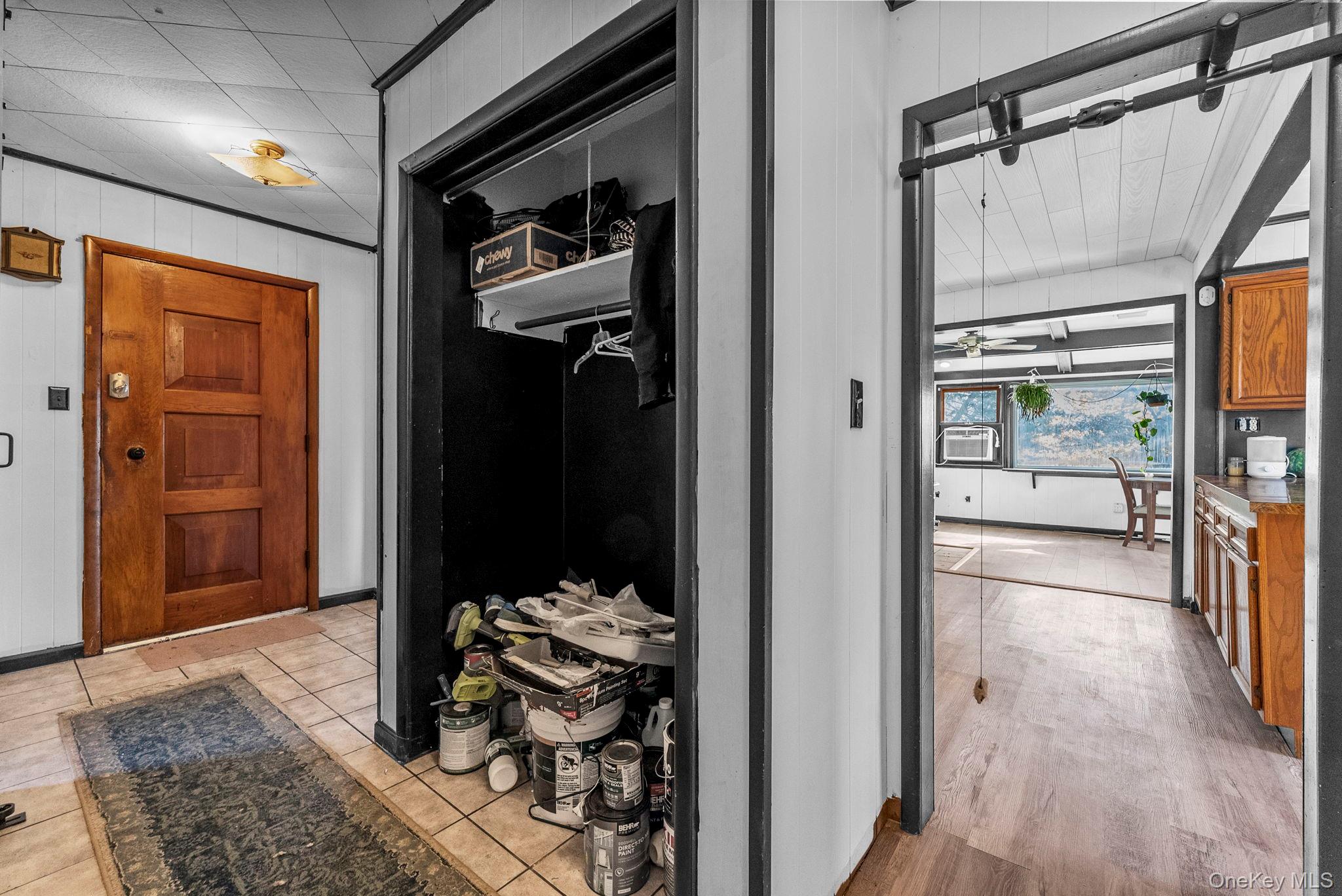 45 Baker Road Hopewell Junction, NY 12533 - Photo 4 of 41 a hallway with white doors wooden floor and front door