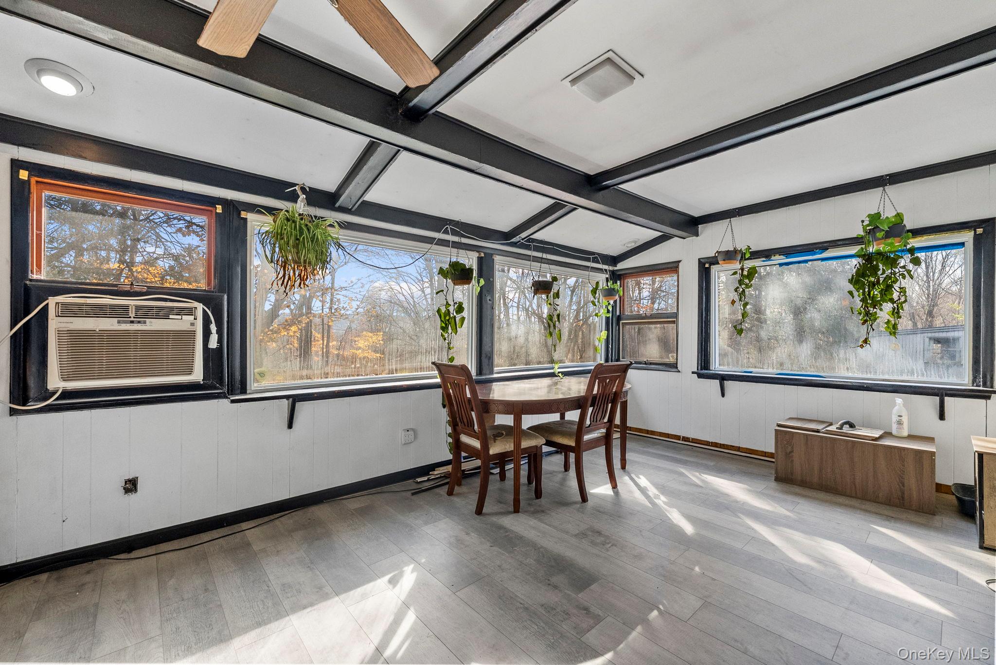 45 Baker Road Hopewell Junction, NY 12533 - Photo 7 of 41 a view of a livingroom with furniture wooden floor and windows