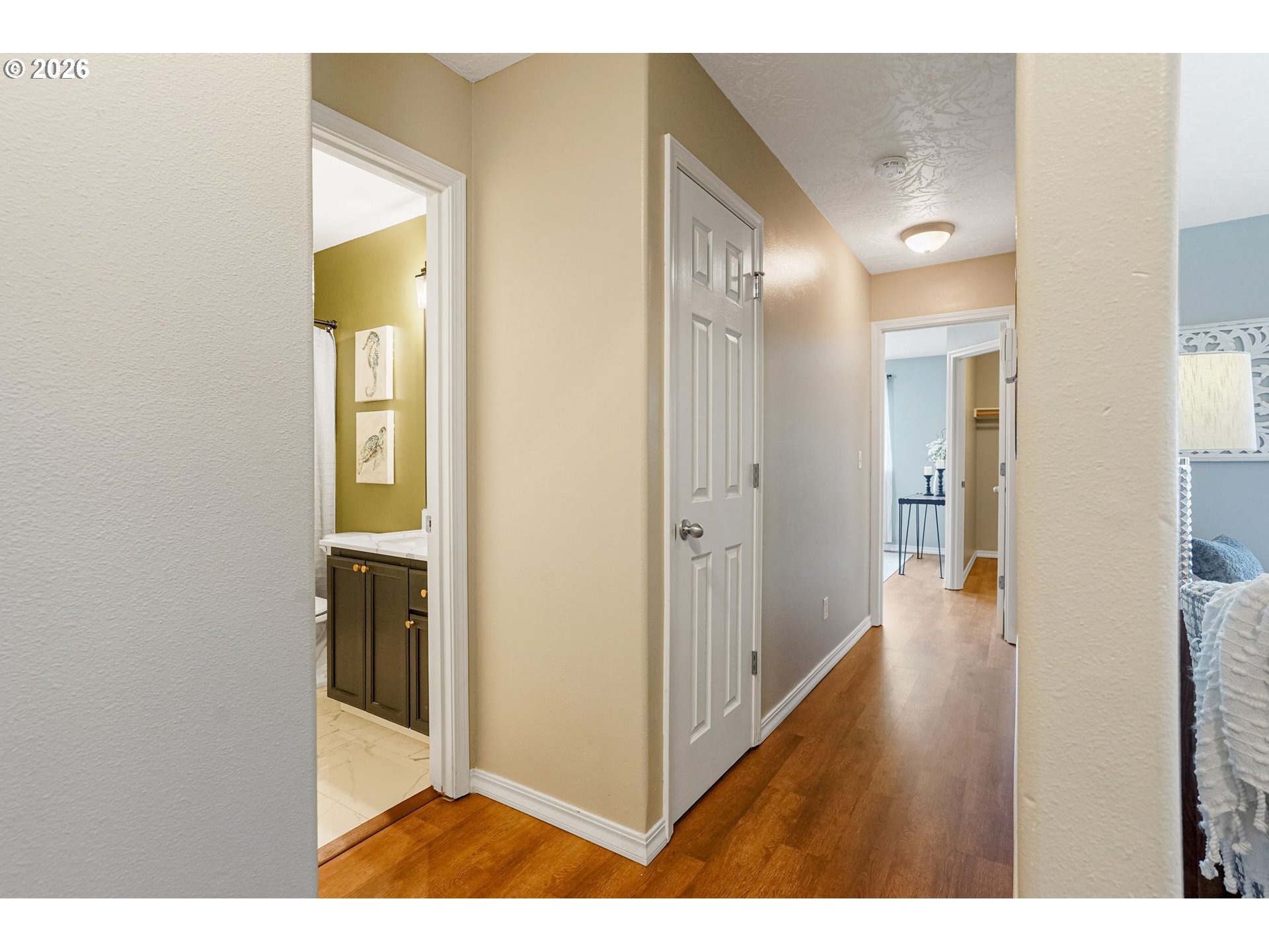 4791 Currant Lane Northeast Salem, OR 97305 - Photo 21 of 42 a view of a hallway with wooden floor