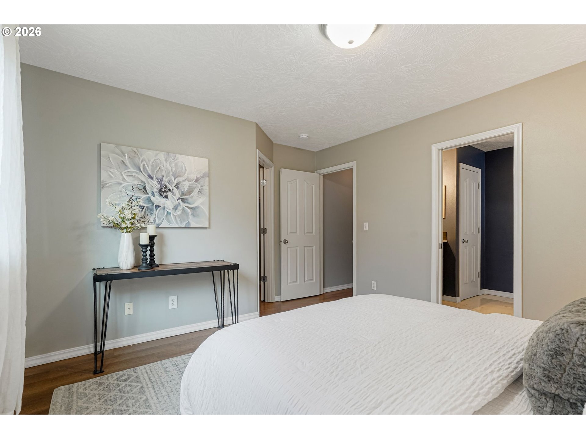 4791 Currant Lane Northeast Salem, OR 97305 - Photo 25 of 42 a bedroom with a bed and a table