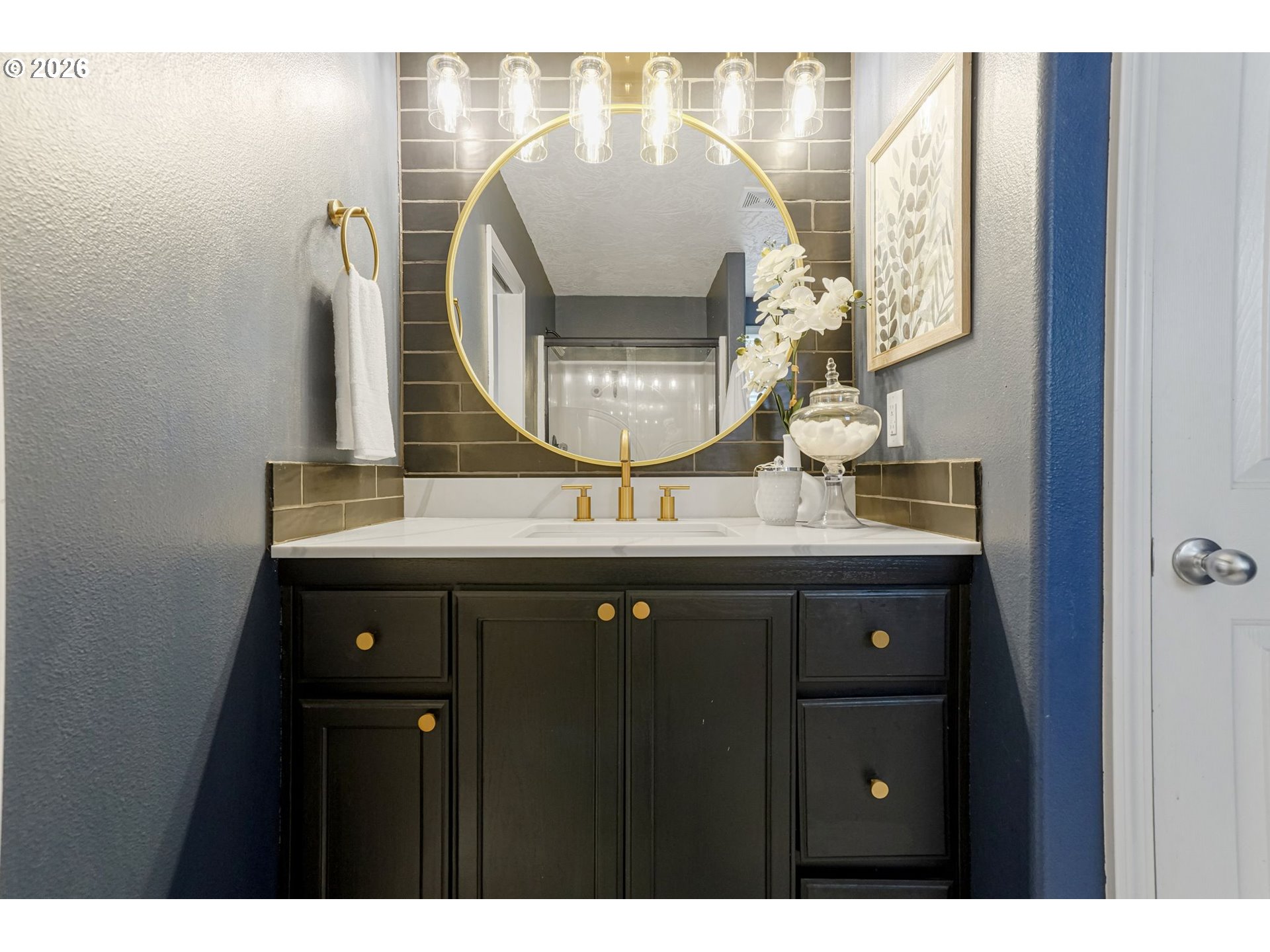 4791 Currant Lane Northeast Salem, OR 97305 - Photo 28 of 42 a bathroom with a sink and a mirror