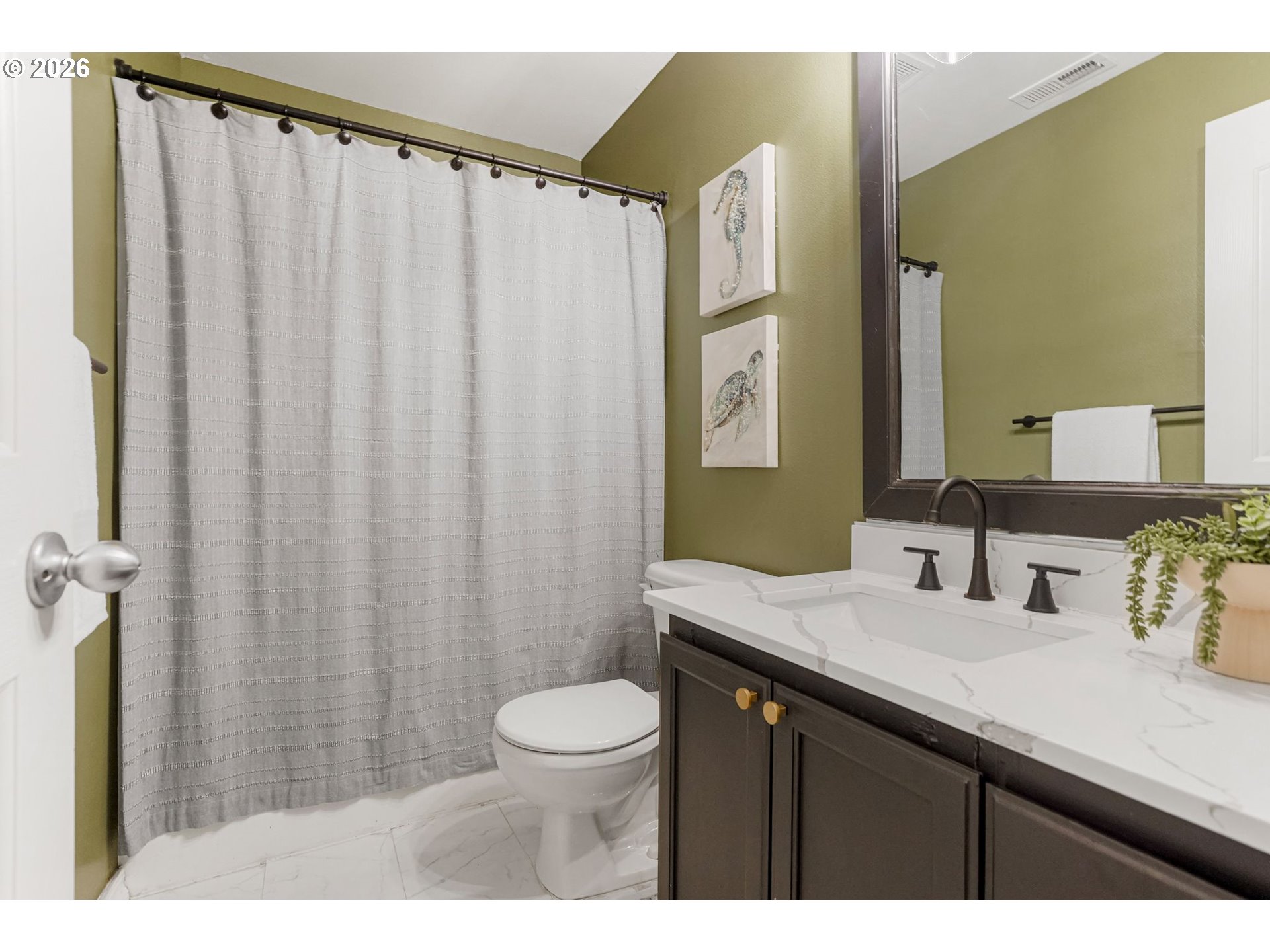 4791 Currant Lane Northeast Salem, OR 97305 - Photo 30 of 42 a bathroom with a sink a toilet and a mirror