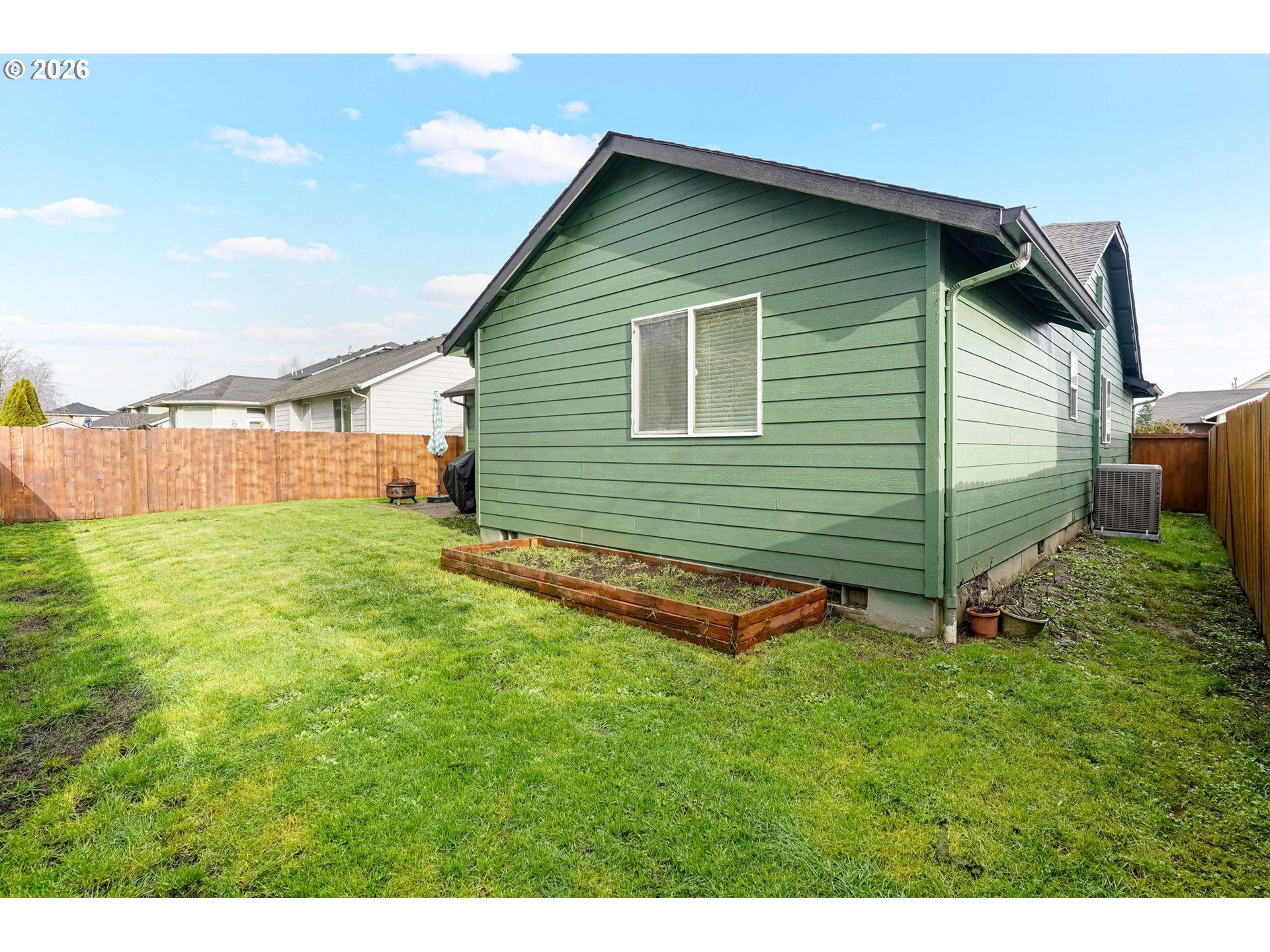 4791 Currant Lane Northeast Salem, OR 97305 - Photo 40 of 42 a backyard of a house with lots of green space