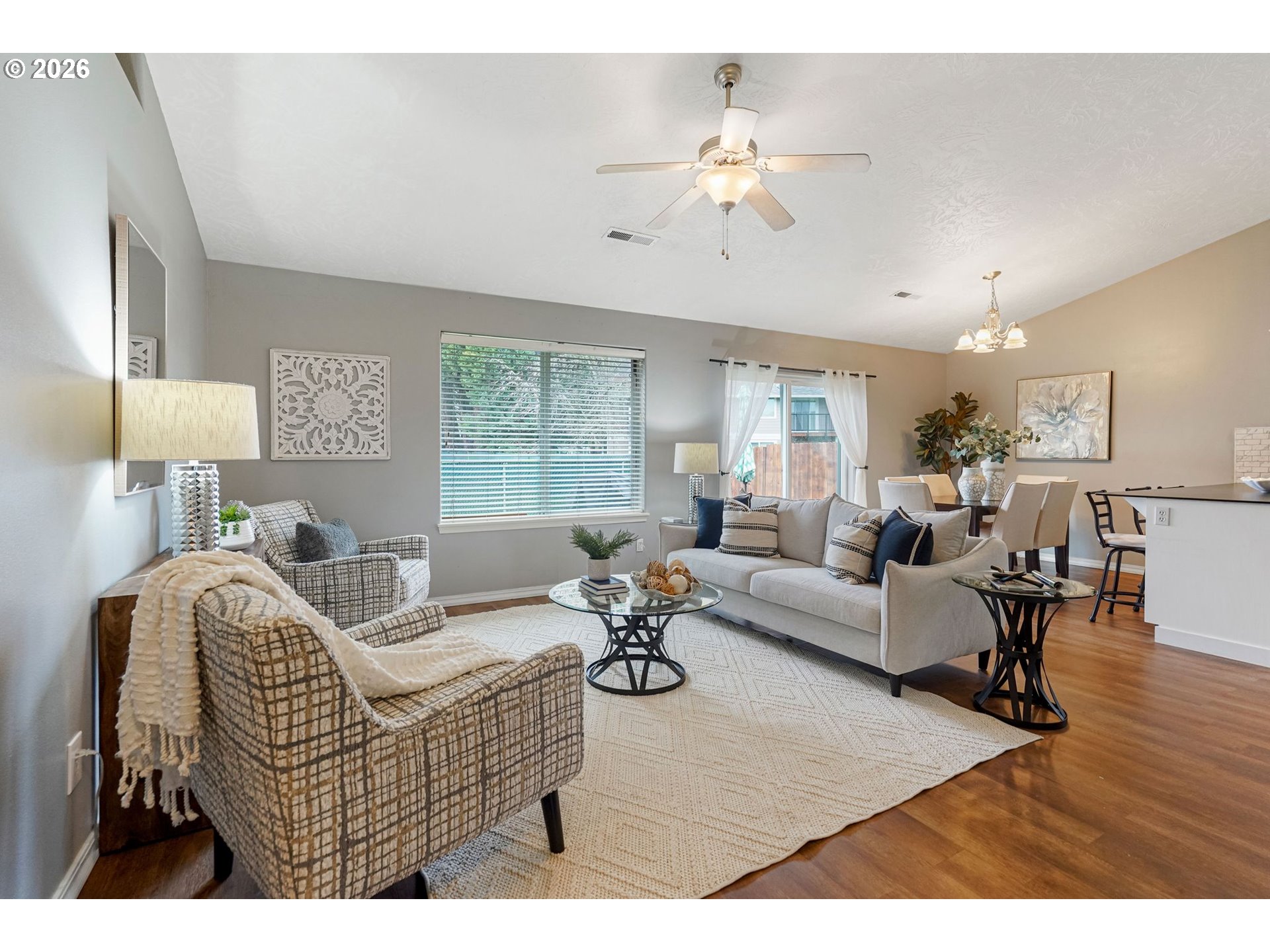 4791 Currant Lane Northeast Salem, OR 97305 - Photo 6 of 42 a living room with furniture and a chandelier