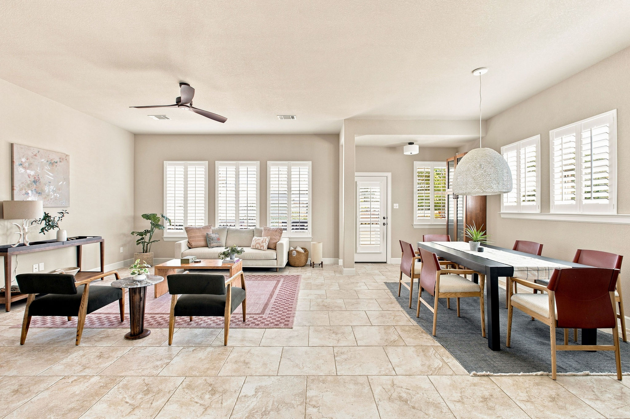 6100 Gunnison Turn Road Austin, TX 78738 - Photo 34 of 34 An open floorplan seamlessly connects the casual living area to a dedicated dining space.