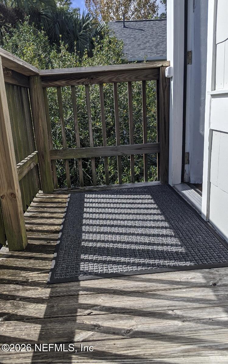 2314 Forbes Street, Unit B Jacksonville, FL 32204 - Photo 11 of 12 a view of a balcony with wooden floor