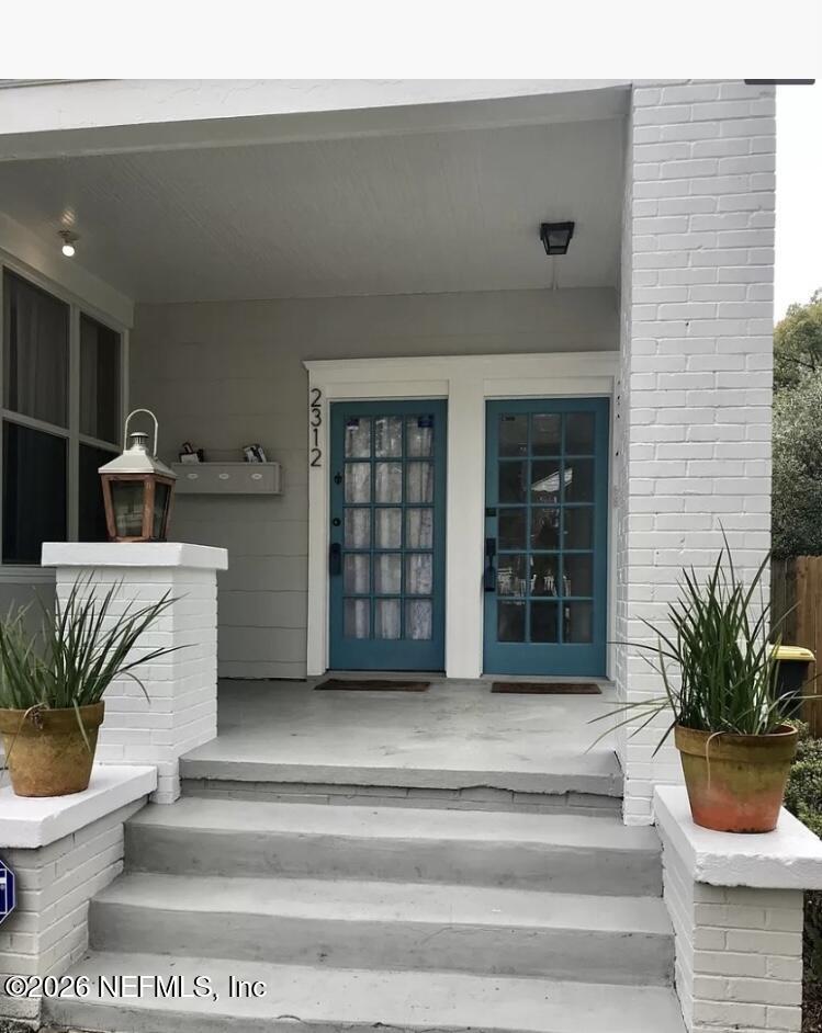 2314 Forbes Street, Unit B Jacksonville, FL 32204 - Photo 2 of 12 a living room with furniture and a potted plant