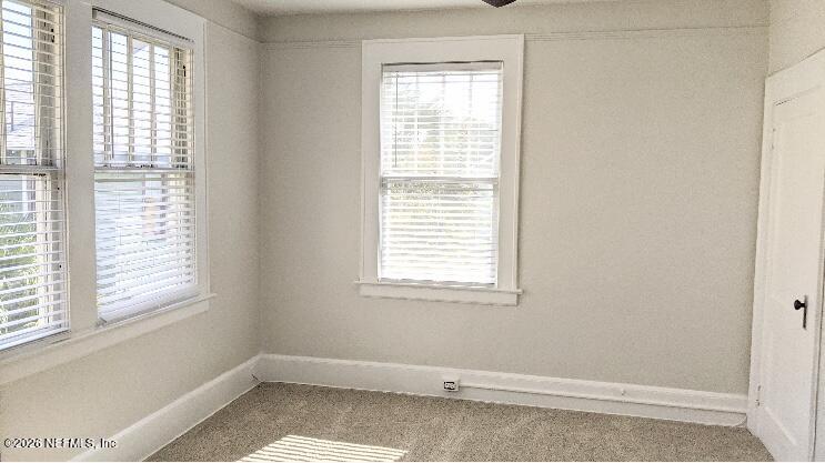 2314 Forbes Street, Unit B Jacksonville, FL 32204 - Photo 9 of 12 an empty room with a window