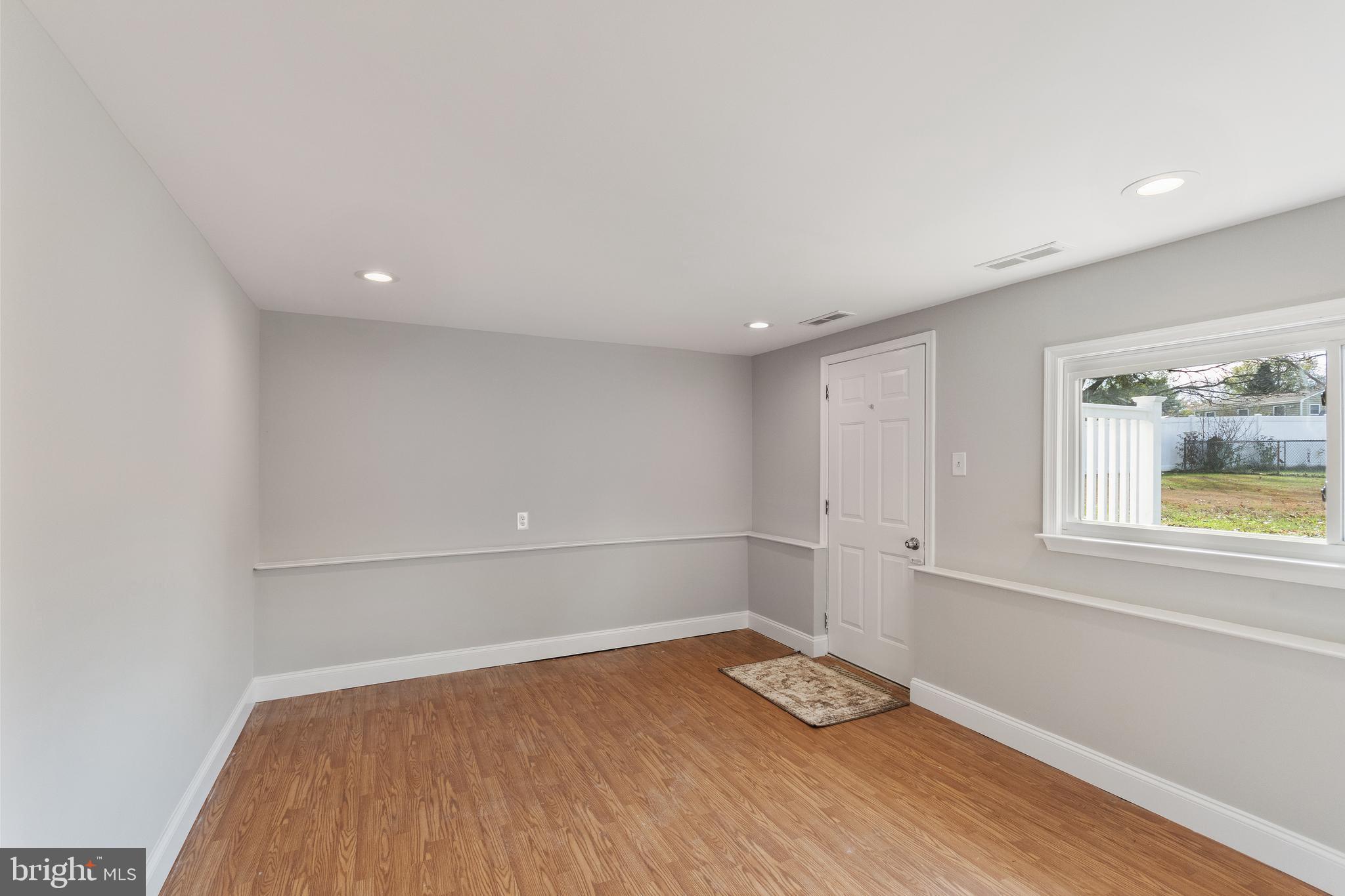 243 Jackson Road Mantua, NJ 08051 - Photo 14 of 18 a view of empty room with wooden floor and fan