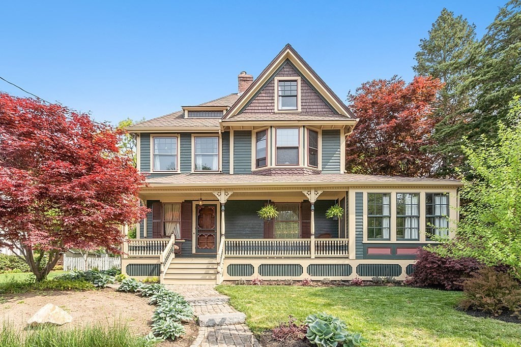 39 Maple Street Stoneham, MA 02180 - Photo 1 of 40 front view of a house with a yard