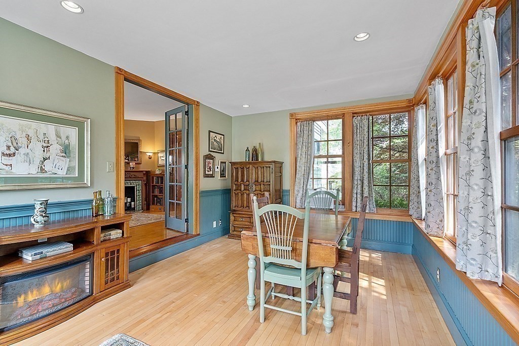 39 Maple Street Stoneham, MA 02180 - Photo 12 of 40 a dining room with furniture and wooden floor