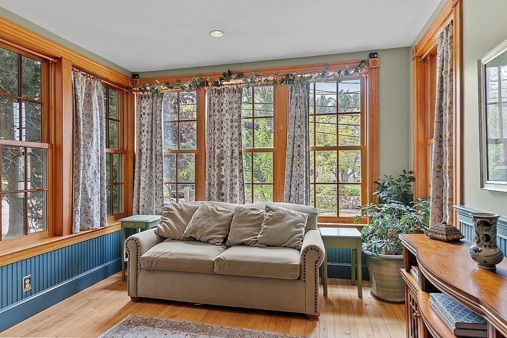 39 Maple Street Stoneham, MA 02180 - Photo 13 of 40 a living room with furniture and large windows