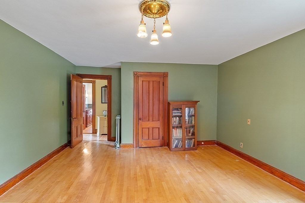 39 Maple Street Stoneham, MA 02180 - Photo 25 of 40 an empty room with closet and windows