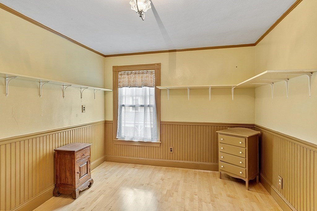 39 Maple Street Stoneham, MA 02180 - Photo 27 of 40 a view of an empty room with a window