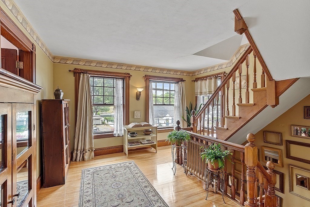 39 Maple Street Stoneham, MA 02180 - Photo 30 of 40 a living room with furniture and a window