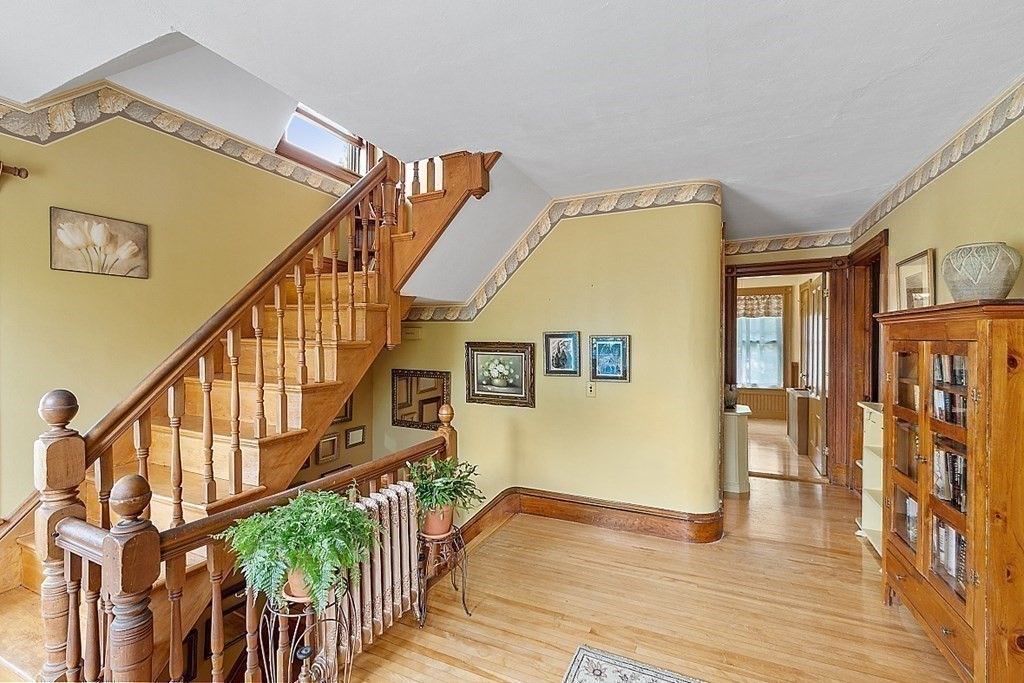 39 Maple Street Stoneham, MA 02180 - Photo 31 of 40 a view of an entryway with wooden floor