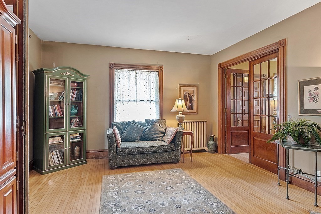 39 Maple Street Stoneham, MA 02180 - Photo 9 of 40 a living room with furniture and a window