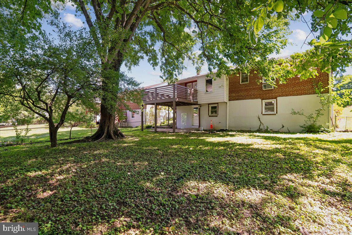 13012 Georgia Avenue Silver Spring, MD 20906 - Photo 29 of 31 Serene backyard retreat under trees.