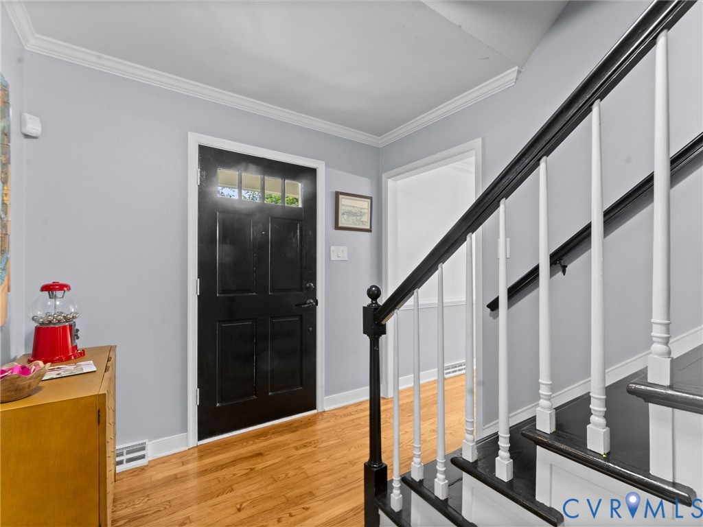 721 Milbrae Road North Chesterfield, VA 23236 - Photo 2 of 63 Inviting foyer with hardwoods and crown molding