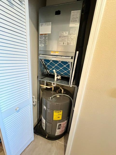 6828 Toland Drive, Unit 302 Melbourne, FL 32940 - Photo 22 of 45 a view of washer and dryer