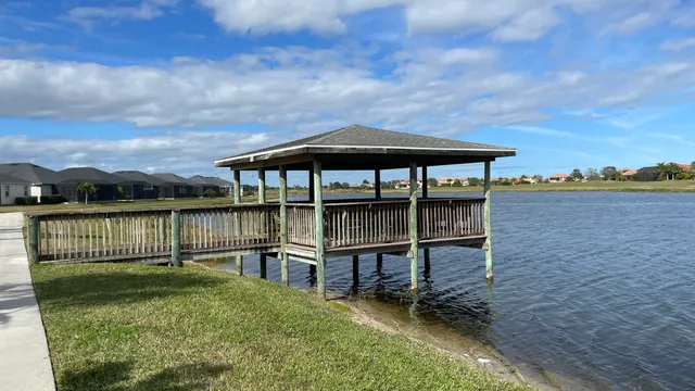 a view of a house with a yard from a patio