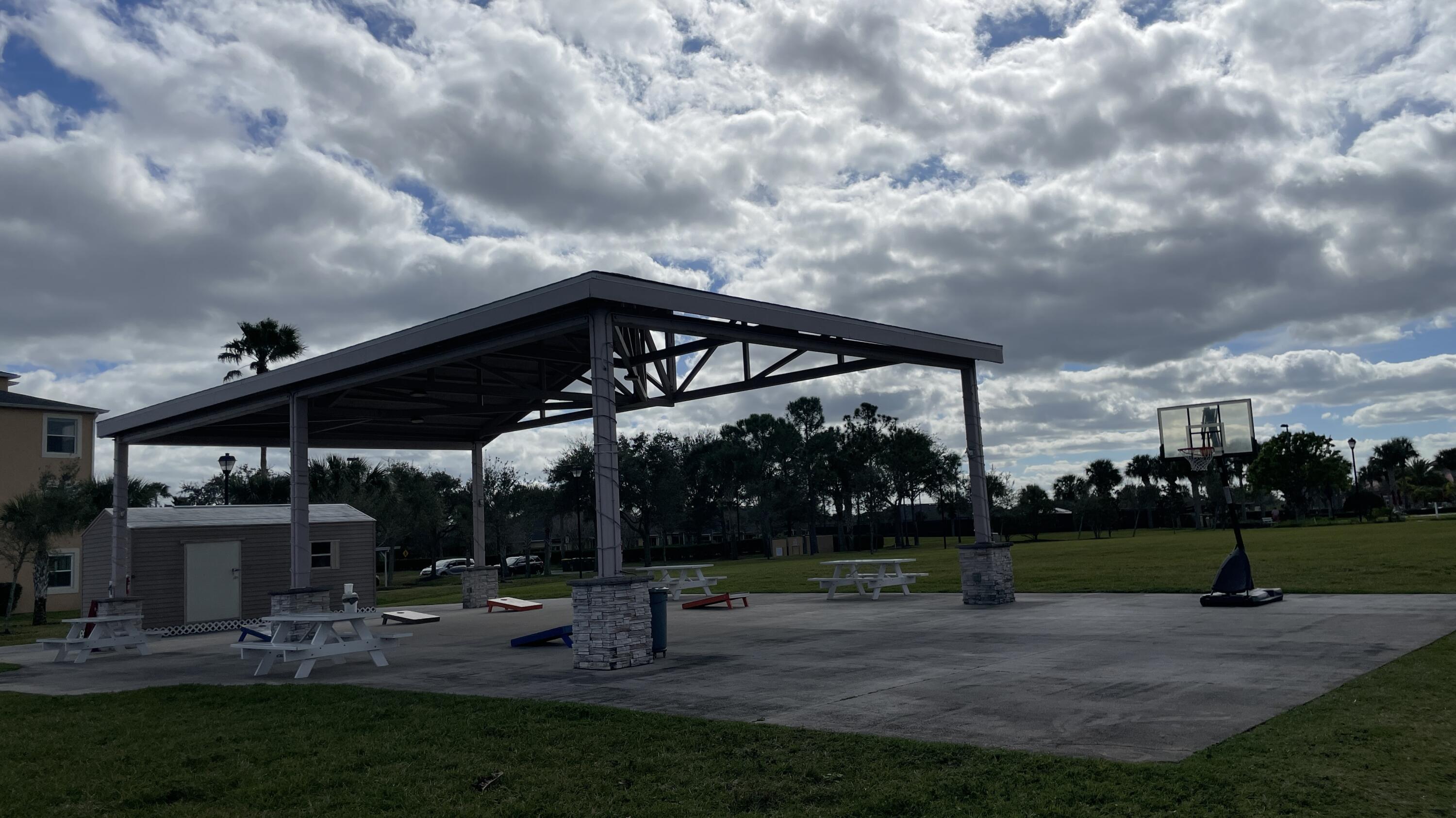 6828 Toland Drive, Unit 302 Melbourne, FL 32940 - Photo 43 of 45 a view of a backyard