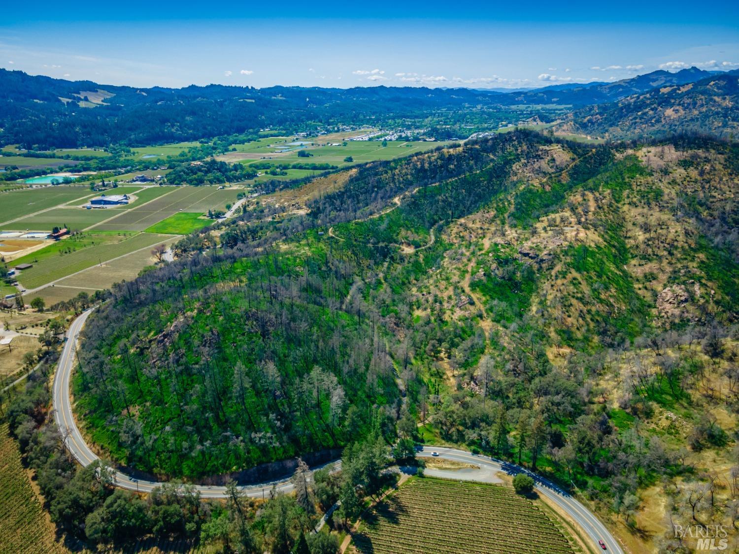 0 Silverado Trail North Calistoga, CA 94515 - Photo 59 of 82 an aerial view of residential house with outdoor space and mountain view in back