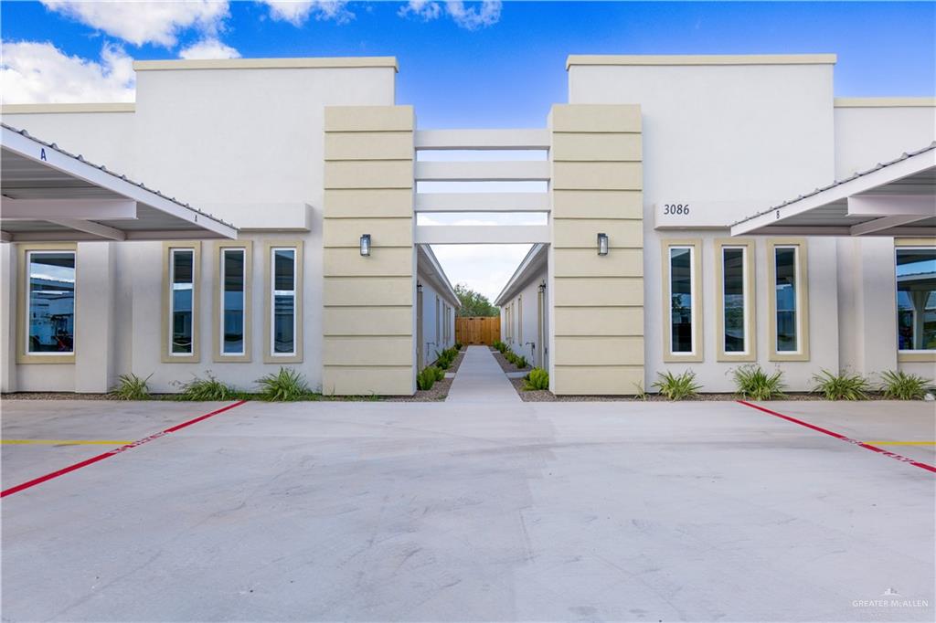 a view of a house with a street