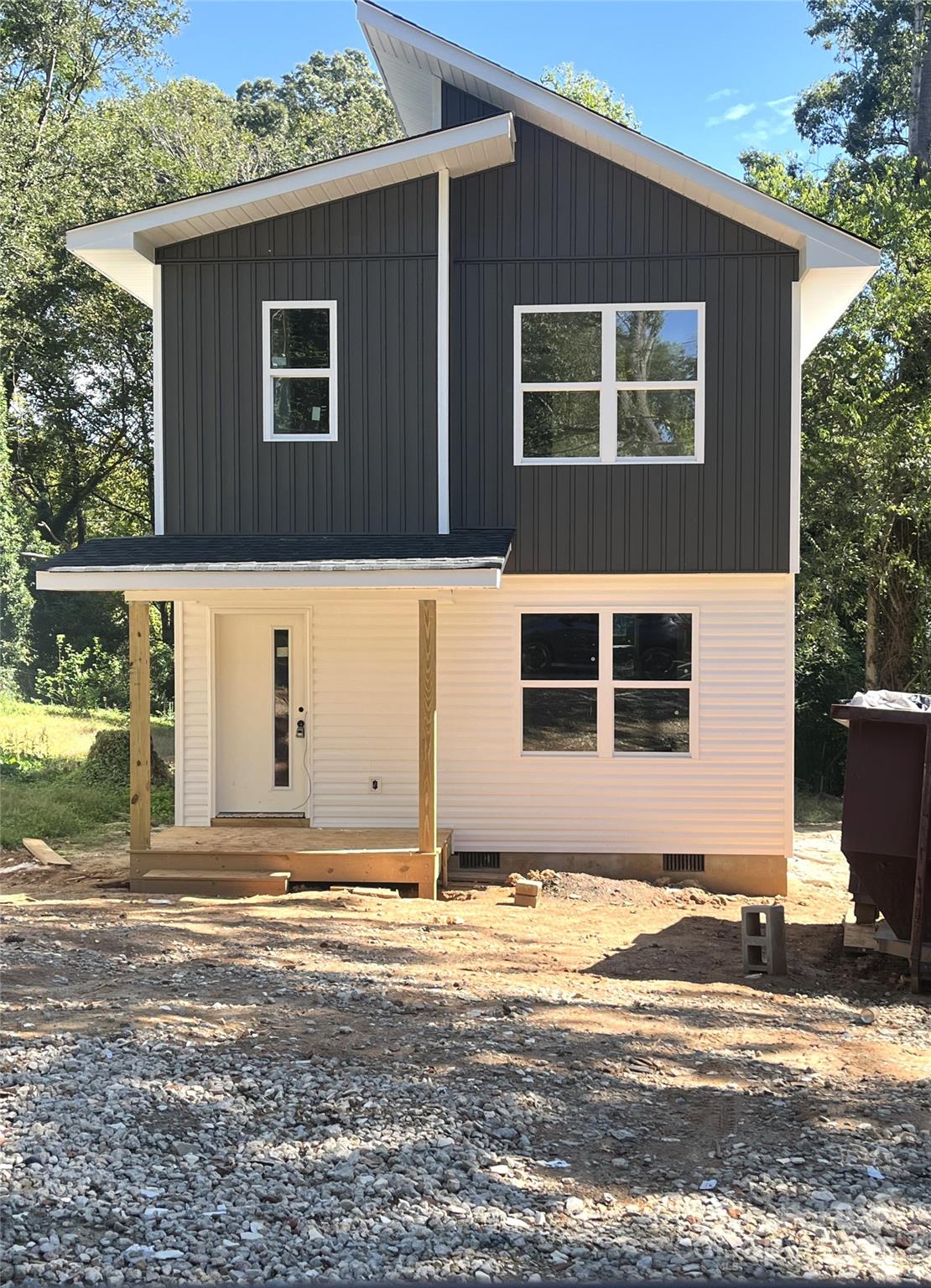 a front view of house with a yard