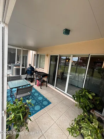 a view of outdoor space with seating area