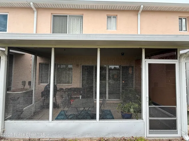 a view of a parked cars in front of a building