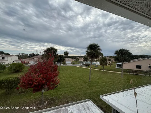 a view of a park with tree s