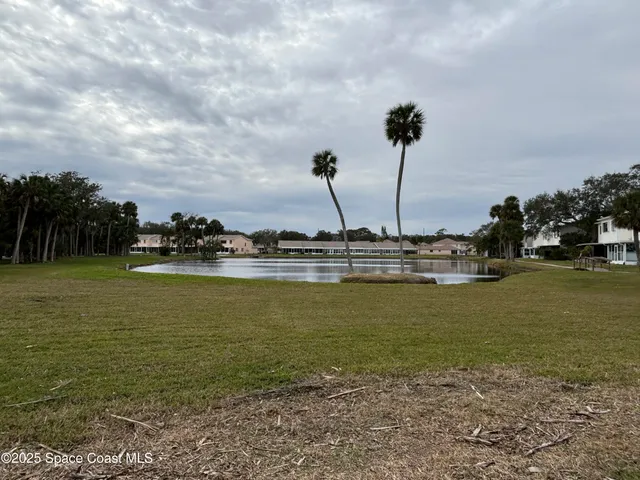a view of a park with swings and slides