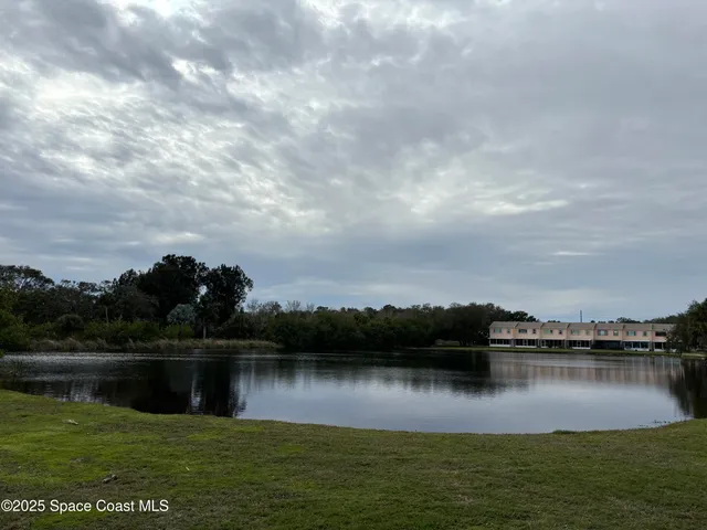 a view of a park with swings and slides