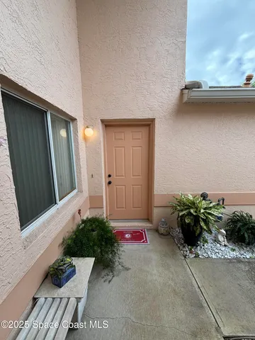 a view of a street with a tree
