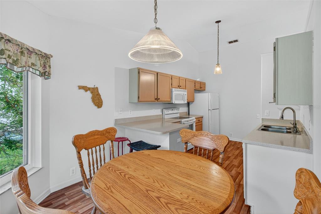 8841 Kipling Avenue Hudson, FL 34667 - Photo 23 of 41 a bedroom with two beds and a table