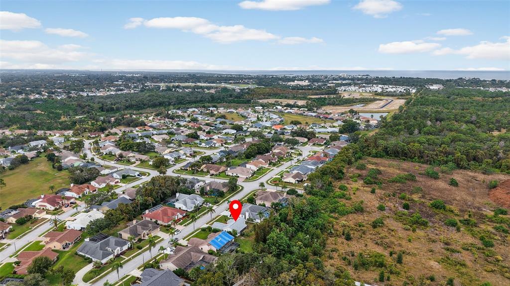 8841 Kipling Avenue Hudson, FL 34667 - Photo 37 of 41 an aerial view of city and lake