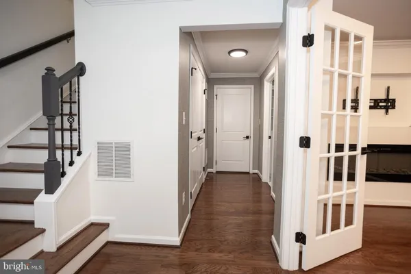 a view of a entryway with wooden floor