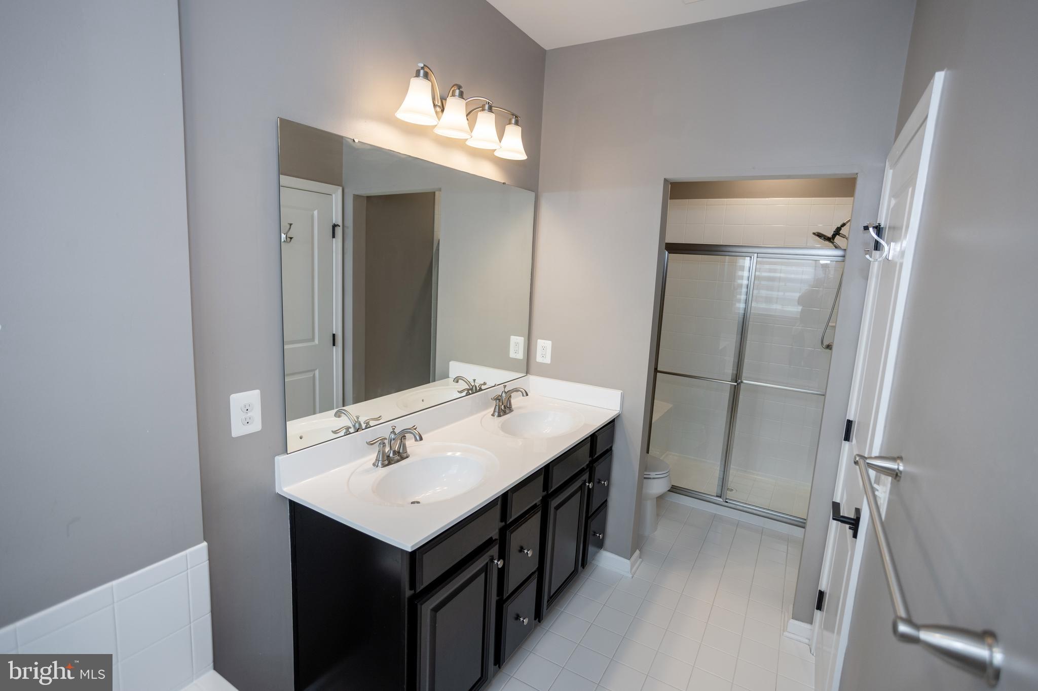 2023 Serviceberry Road Dumfries, VA 22026 - Photo 35 of 55 Primary bathroom