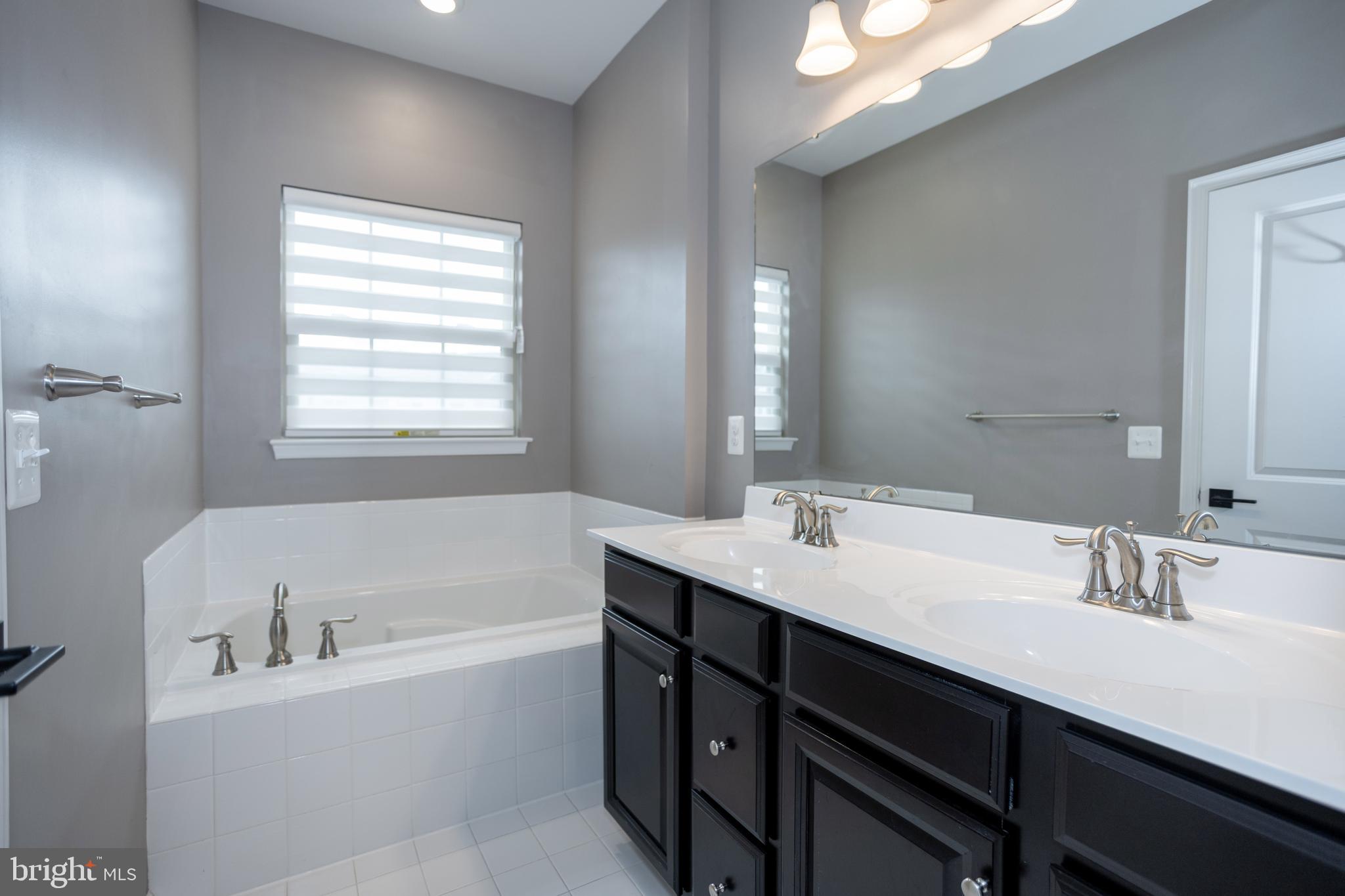 2023 Serviceberry Road Dumfries, VA 22026 - Photo 36 of 55 Primary bathroom1