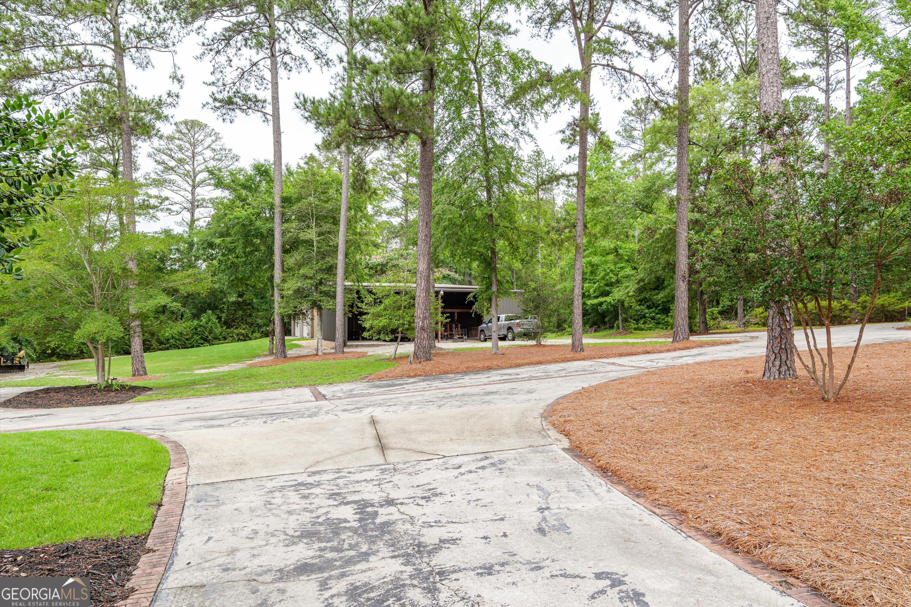 6218 Columbia Road Appling, GA 30802 - Photo 81 of 98 2400 sq foot temp controlled workshop with 3 outside bays and lawn equipment garage