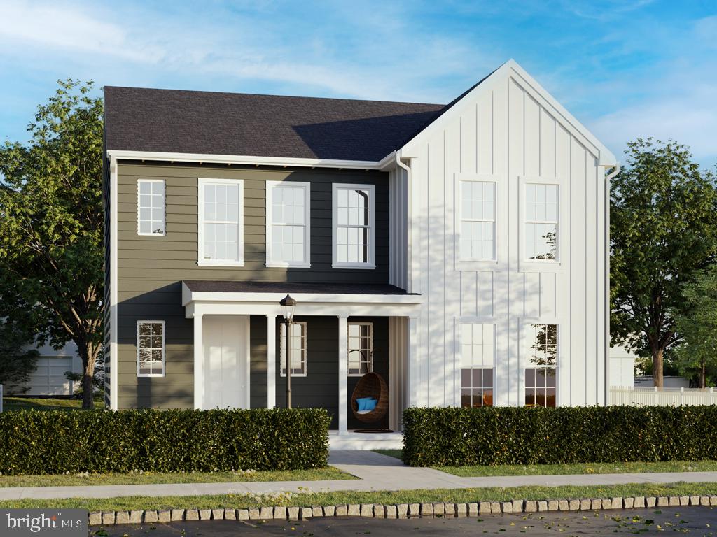 104 Merchant Avenue, Unit CARTER Mount Joy, PA 17552 - Photo 1 of 23 a front view of a house with a yard