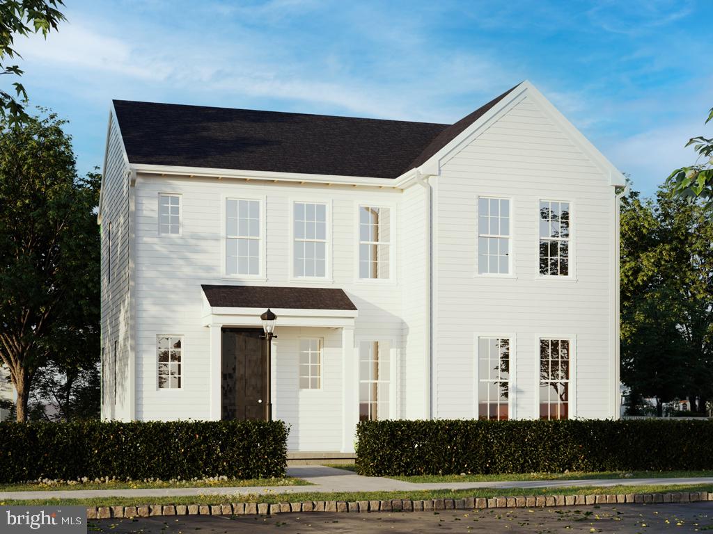 104 Merchant Avenue, Unit CARTER Mount Joy, PA 17552 - Photo 2 of 23 a front view of a house with a yard