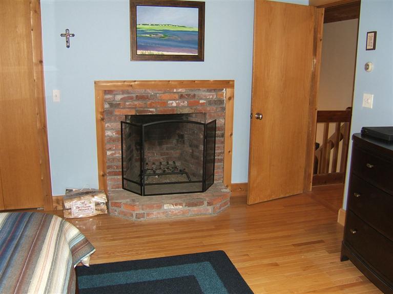 178 River Ridge Road Marstons Mills, MA 02648 - Photo 11 of 18 a view of an empty room and fire place