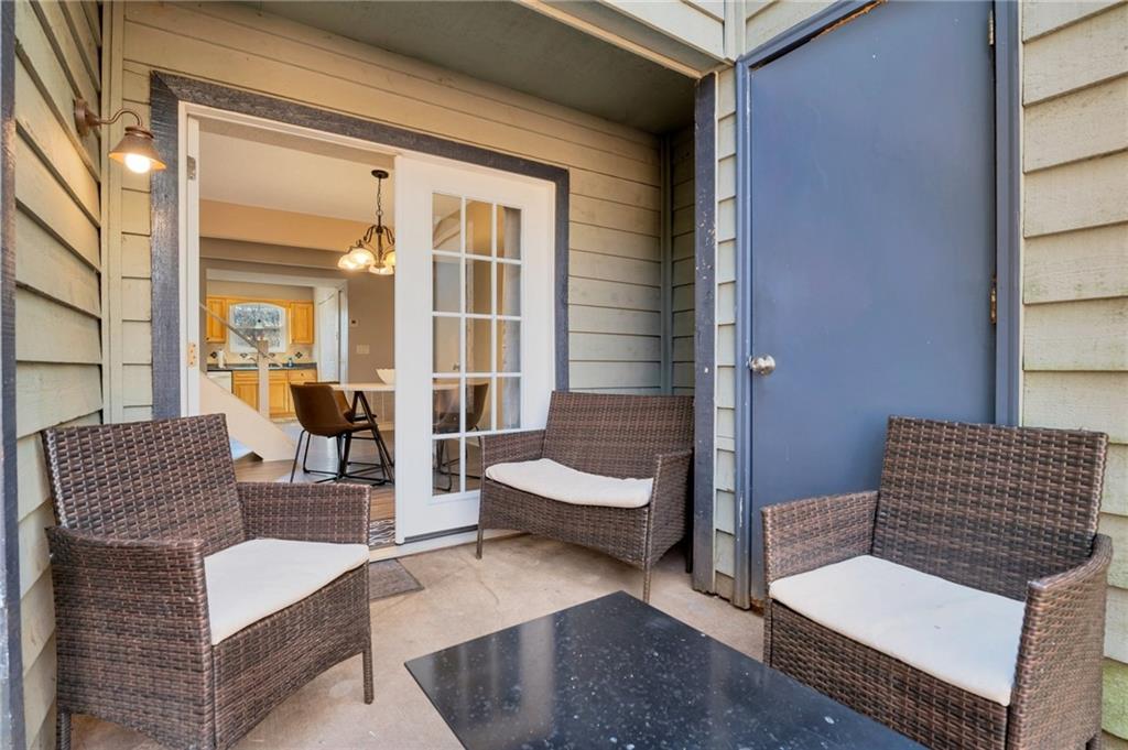 Undisclosed Address Marietta, GA 30064 - Photo 15 of 25 a outdoor living space with furniture and a potted plant