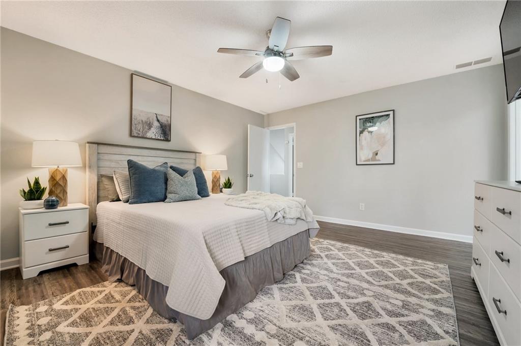 Undisclosed Address Marietta, GA 30064 - Photo 22 of 25 a bedroom with a large bed and a window