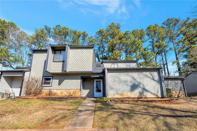 a view of a house with a patio